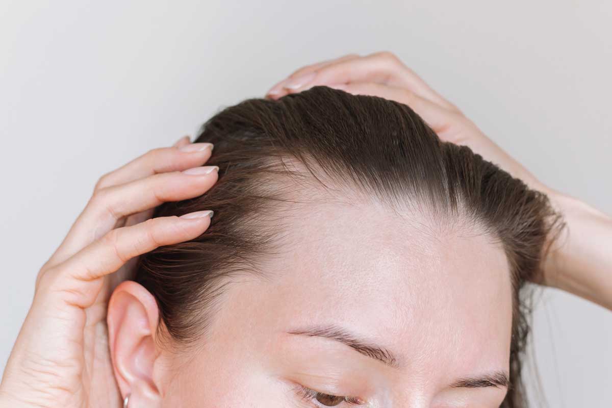 Client with thinning hair considering a natural-looking wig solution