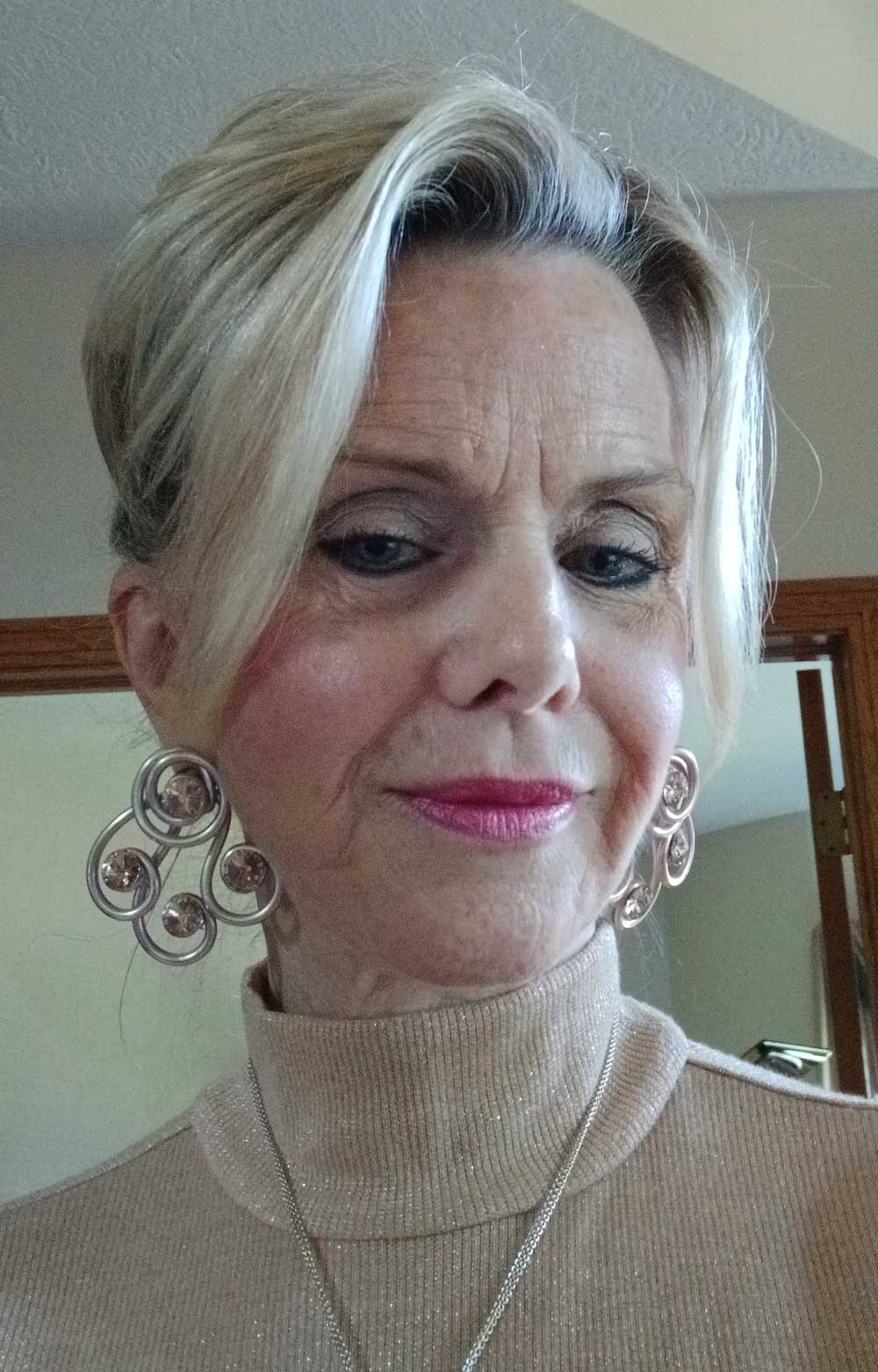 Woman wearing a human hair wig with natural blonde style